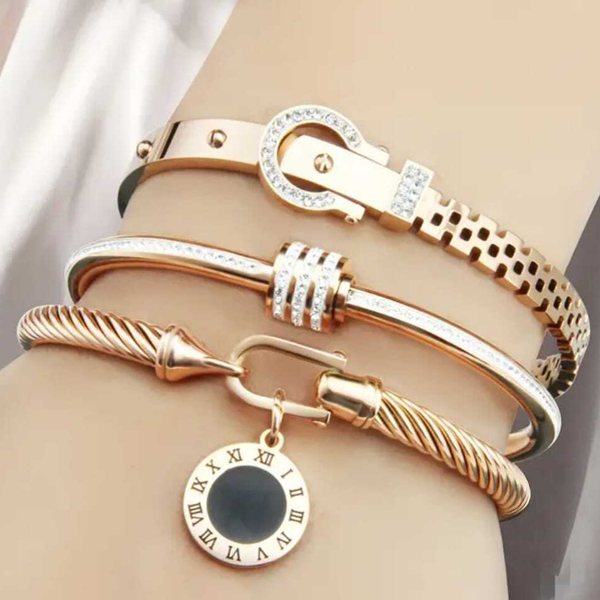 Pulseras de acero color dorado